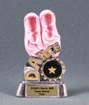 This is a dance award featuring pink slippers 