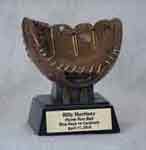 This is a image of a baseball holder that looks like a baseball glove