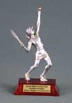 This is a image of a pewter gray female tennis player in a playing pose standing on a rectangle red base